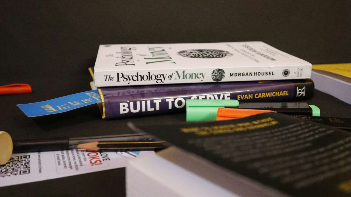 A small pile of financial books