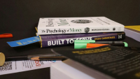 A small pile of financial books
