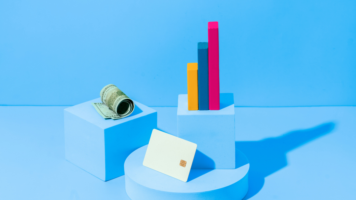 a bright blue image which includes financial items