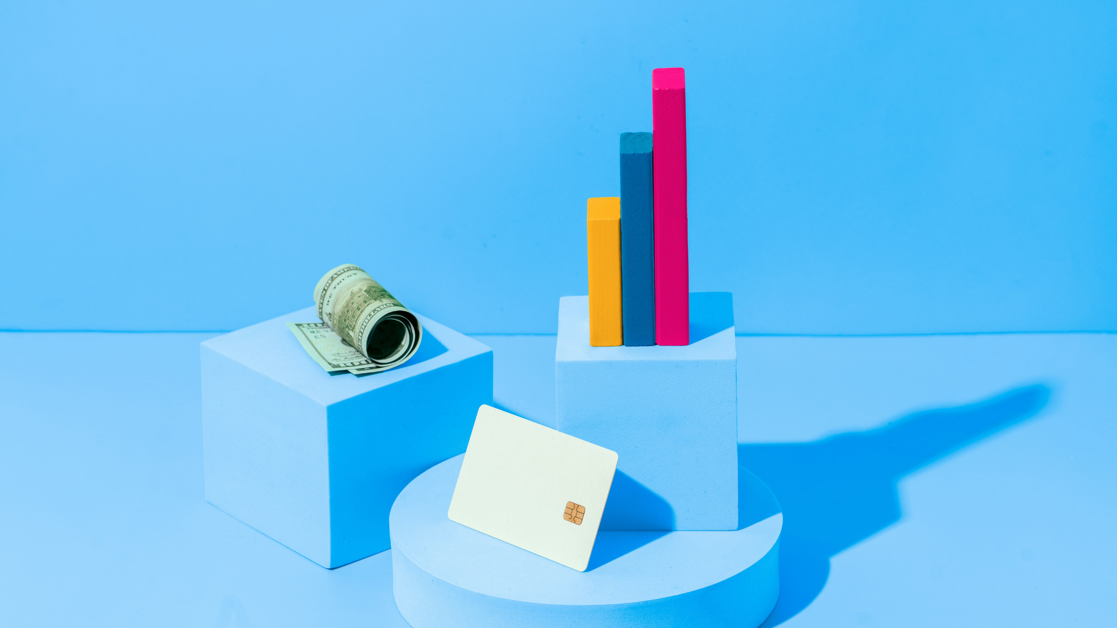 a bright blue image which includes financial items