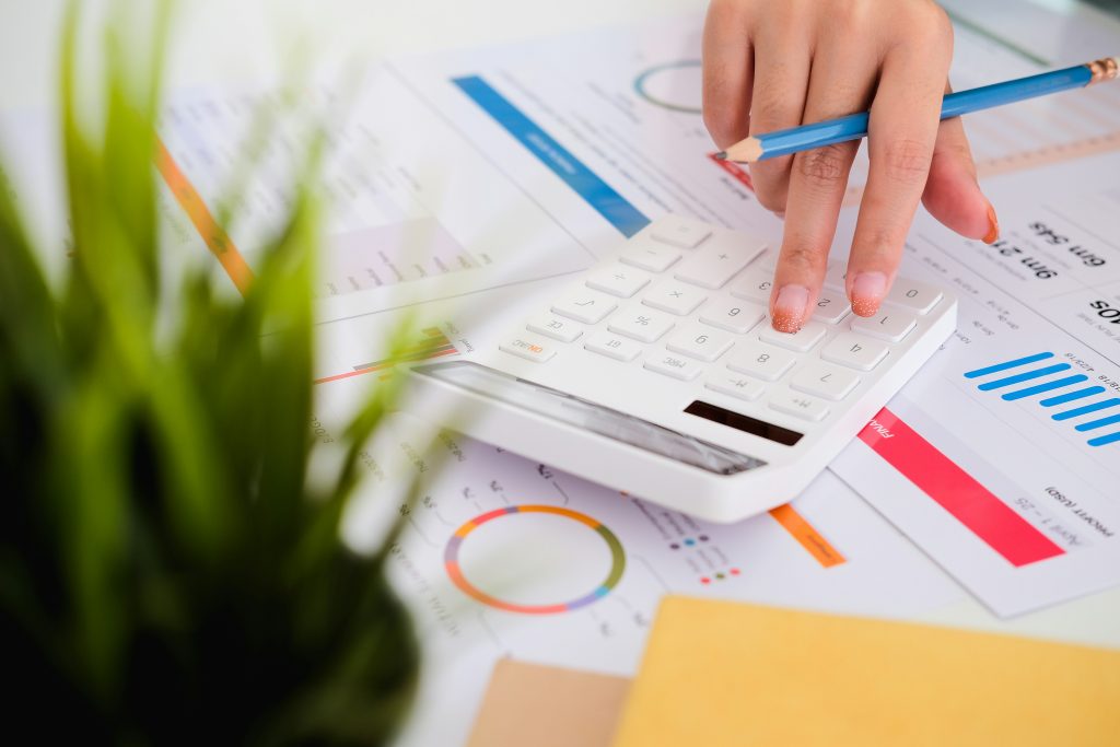 Calculating data with charts and calculator.