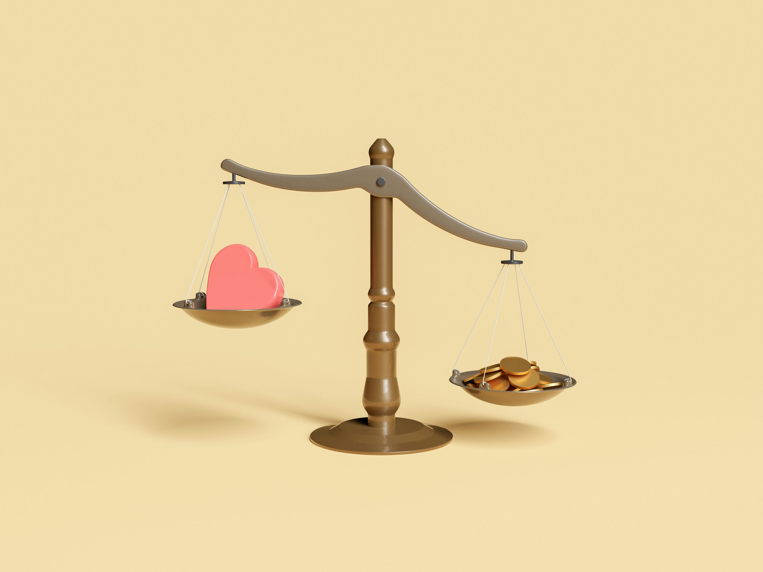 A set of scales with coins on one side and a heart on the other