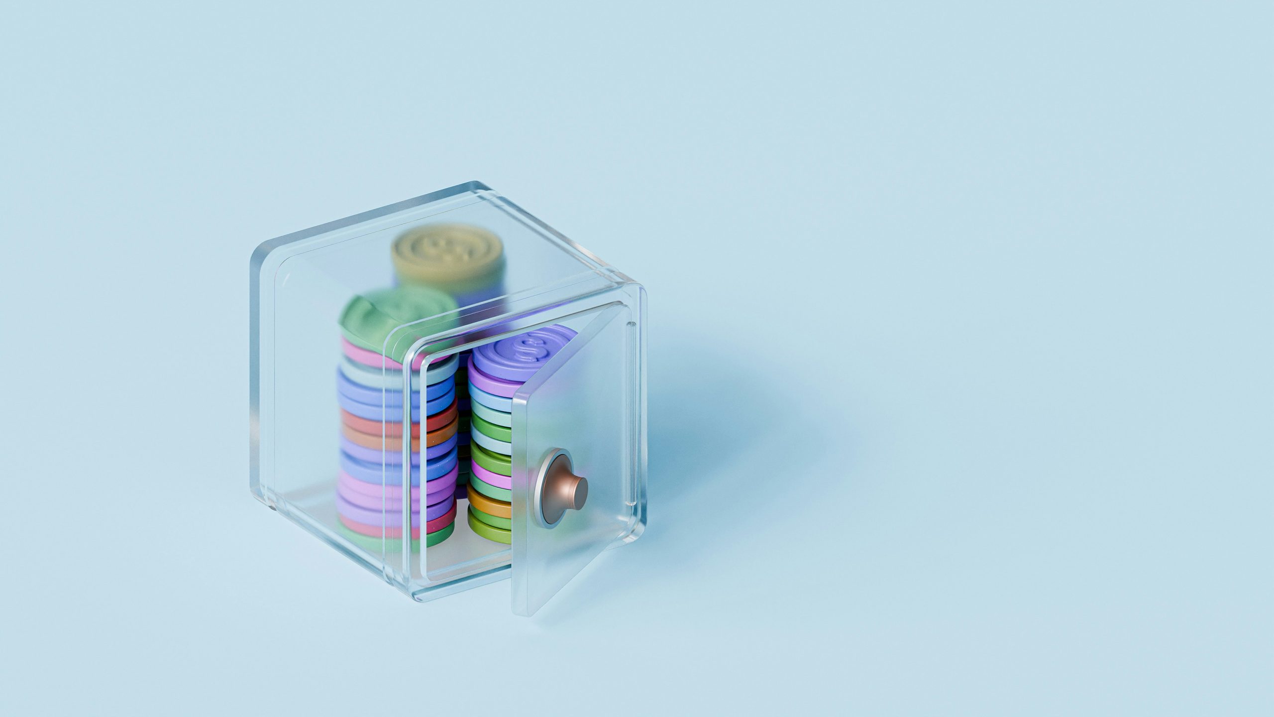 Colourful coins inside a tiny safe