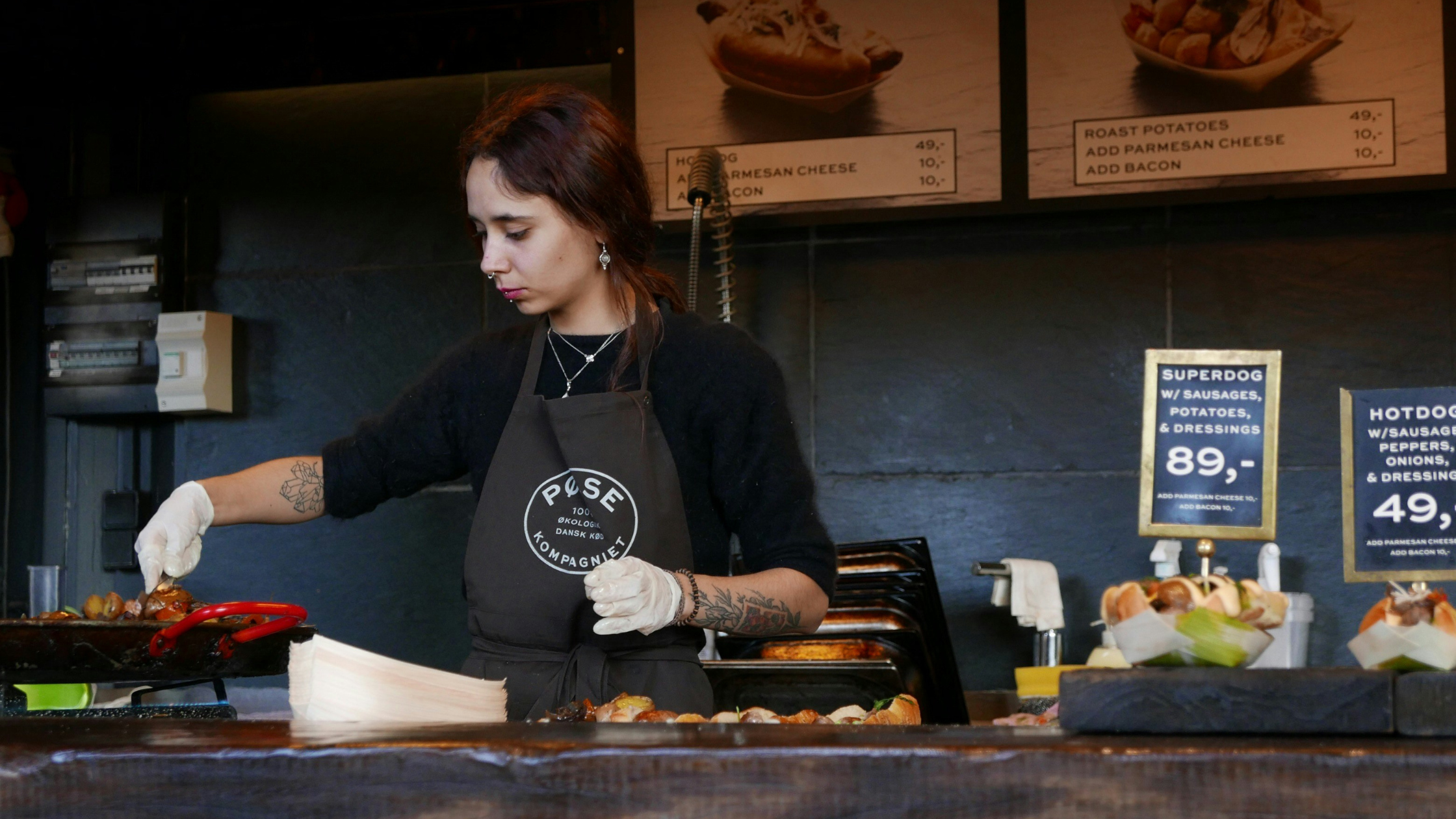 a barista serving food