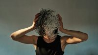 An artistic portrayal of a head full of emotions