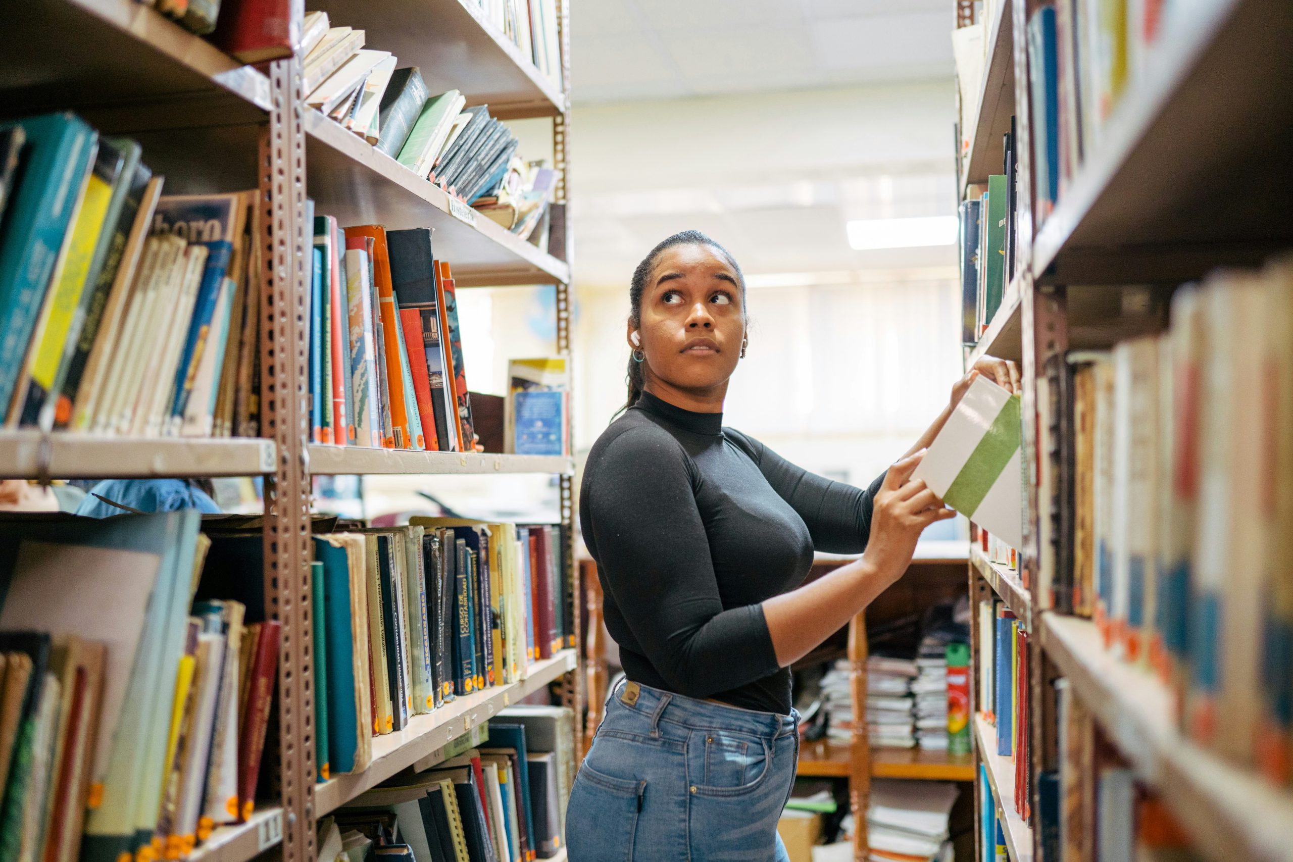 A young woman in a library
